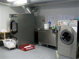 Bố trí thiết bị trong xưởng giặt là ủi công nghiệp